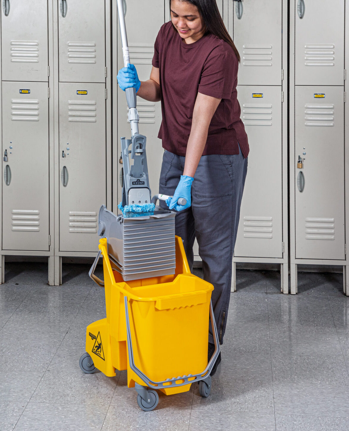 dual compartment yellow bucket school setting