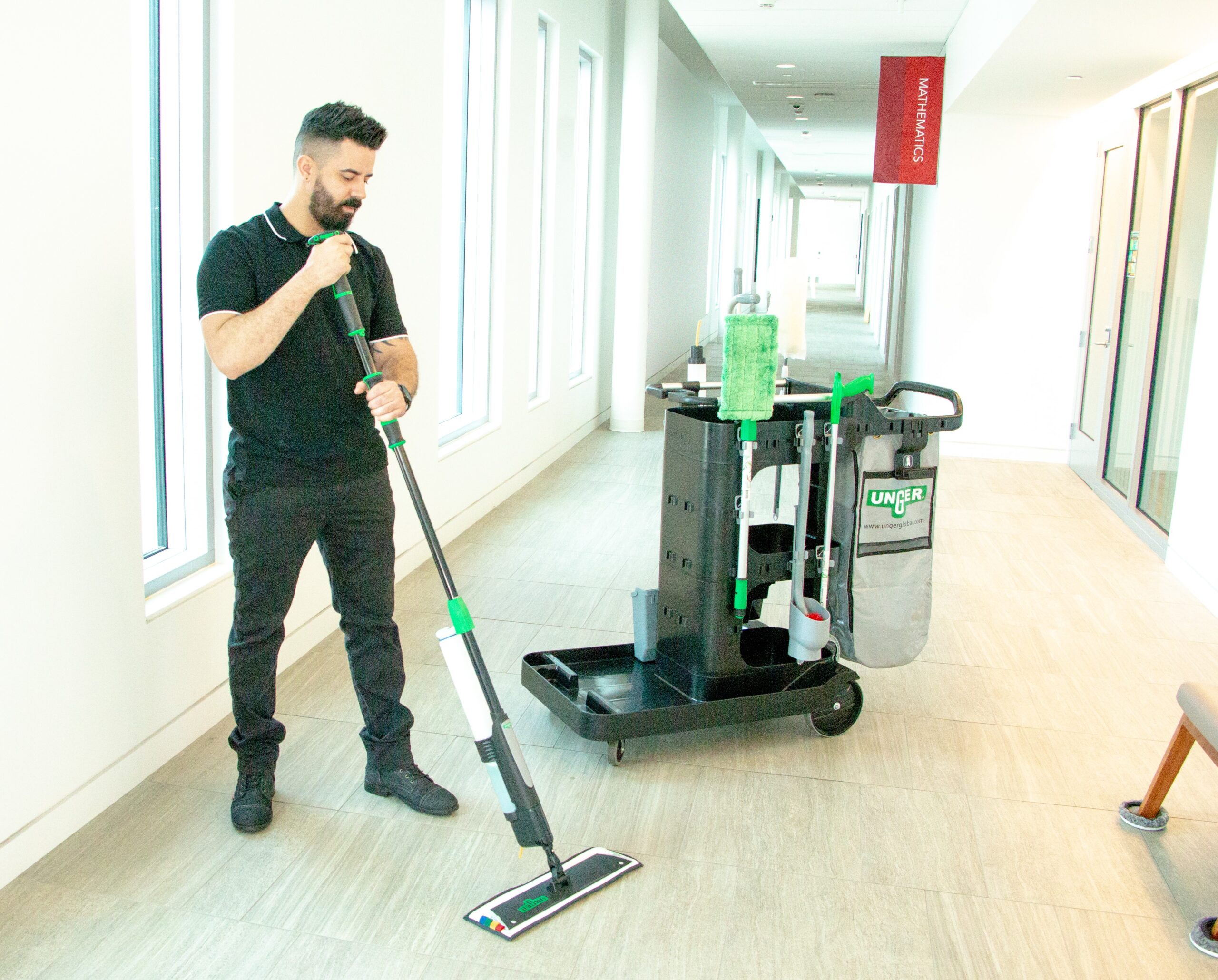 IMG_3229_CRTSP_UE_SpotCleanRxCart_ProductFeature_InUse_Shot7_Raoul_Mopping_in_Hallway
